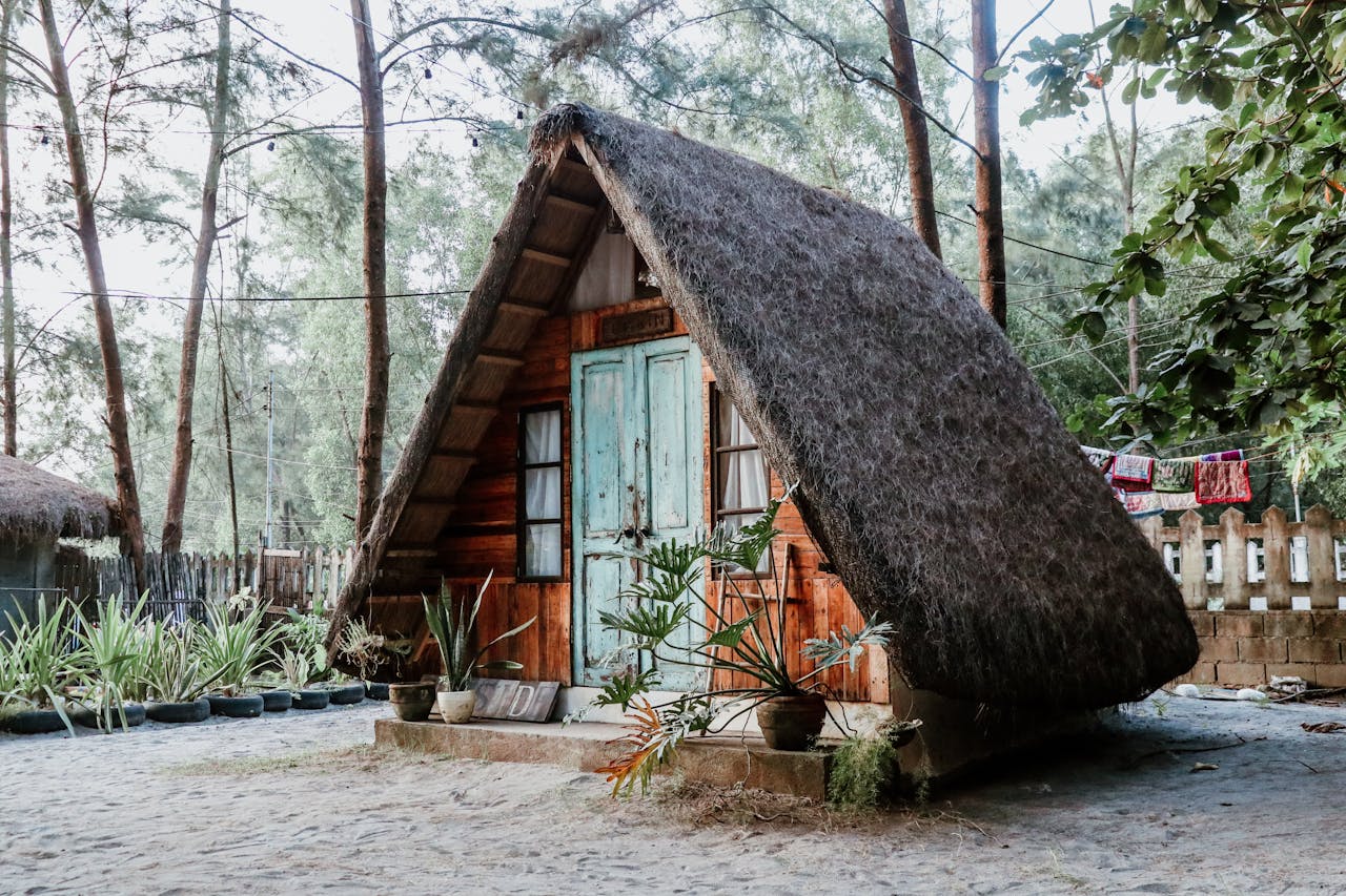Explore this cozy A-frame cabin nestled in the lush greenery of Iba, Philippines. Perfect for a tropical escape.